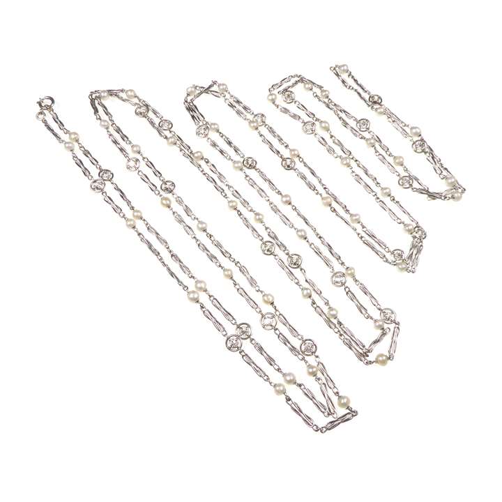 Platinum, diamond and pearl very long chain necklace